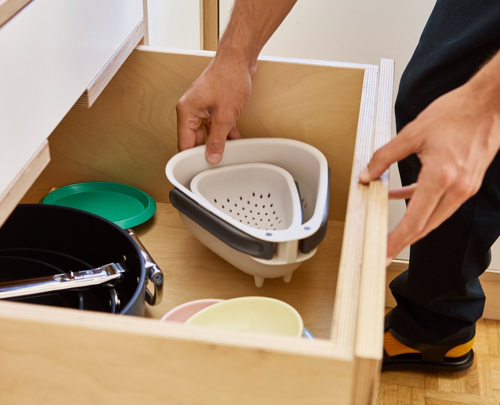 [half-width] Droplet Mini White Colander with Folding Handle