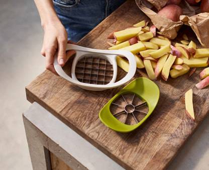 [hidden] [lifestyle] Nest™ Press 2-in-1 Fruit & Vegetable Cutter